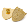 Die Struck Metal Shield Gold Pin with Sandblast Background